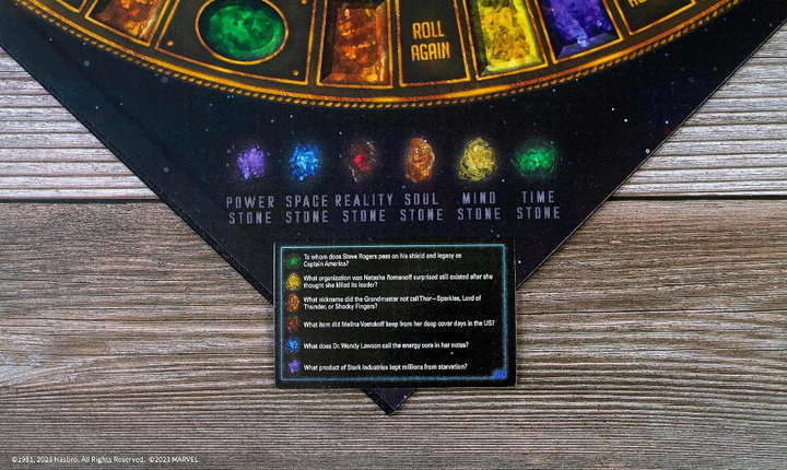 Trivial Pursuit: Marvel Cinematic Universe Ultimate Edition | Officially Licensed | Collectible Trivia Board Game Featuring 6 Infinity Stone Location Movers, 1800 Questions, MCU Phases 1-3