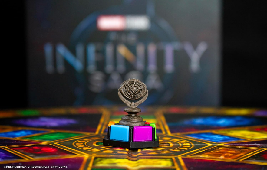 Trivial Pursuit: Marvel Cinematic Universe Ultimate Edition | Officially Licensed | Collectible Trivia Board Game Featuring 6 Infinity Stone Location Movers, 1800 Questions, MCU Phases 1-3