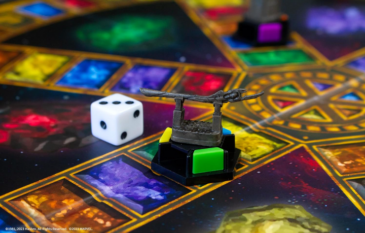 Trivial Pursuit: Marvel Cinematic Universe Ultimate Edition | Officially Licensed | Collectible Trivia Board Game Featuring 6 Infinity Stone Location Movers, 1800 Questions, MCU Phases 1-3